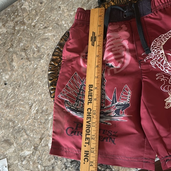 Disney Pirates of the Caribbean swim trunks sz xsmall burgundy New with tag - Picture 10 of 10